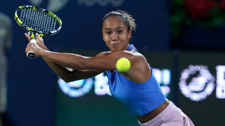 Canada's Leylah Fernandez returns the ball to Austria's Julia Grabher during the Dubai Duty Free Tennis Championships in Dubai, United Arab Emirates, Sunday, Feb 19, 2023. (Kamran Jebreili/AP Photo)