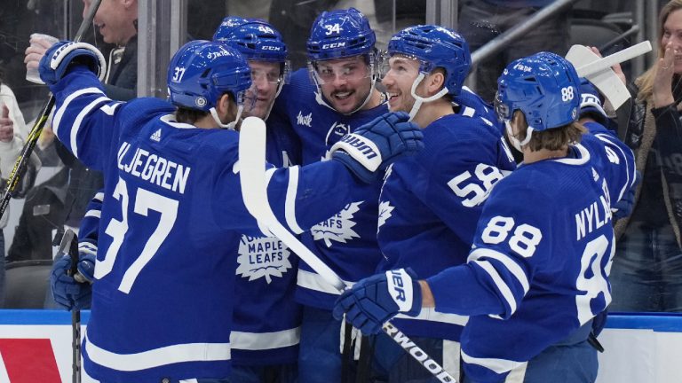 Toronto Maple Leafs centre Auston Matthews (34) celebrates his goal against the Winnipeg Jets with teammates during second period NHL hockey action in Toronto on Thursday Jan. 19, 2023. (Nathan Denette/CP)