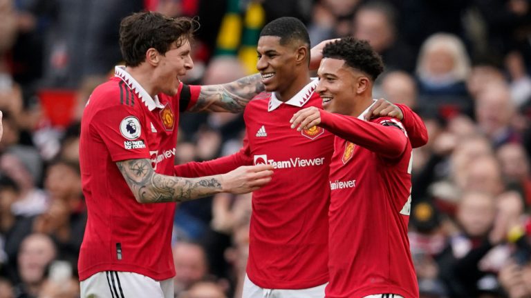Manchester United's Marcus Rashford, centre, celebrates after scoring his side's second goal during the English Premier League soccer match between Manchester United and Leicester City at the Stamford Bridge stadium. (Dave Thompson/AP)