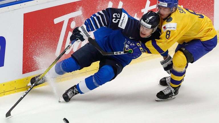 Sweden's Rasmus Sandin, right, challenges Finland's Antti Saarela, left, during the U20 Ice Hockey Worlds bronze medal match between Finland and Sweden in Ostrava, Czech Republic, Sunday, Jan. 5, 2020. (Petr David Josek/AP)