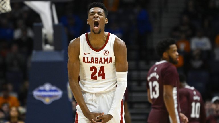 Alabama forward Brandon Miller (24) reacts to scoring against Mississippi State during the first half of an NCAA college basketball game in the third round of the Southeastern Conference tournament, Friday, March 10, 2023, in Nashville, Tenn. (John Amis/AP)
