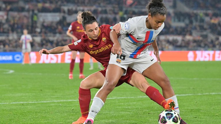 Barcelona's Geyse, right, and Roma's Elisa Bartoli battle for the ball during the women's Champions League soccer match between Roma and Barcelona at Olimpic Stadium, Rome, Italy, Tuesday March 21, 2023. (Alfredo Falcone/LaPresse via AP)