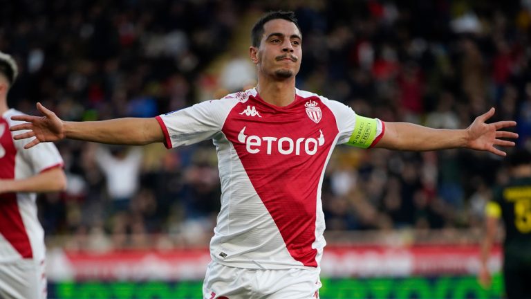 Monaco's Wissam Ben Yedder celebrates scoring his side's 2nd goal during a French League One soccer match between Monaco and Paris Saint-Germain at the Stade Louis II in Monaco, Saturday, Feb. 11, 2023. (Daniel Cole/AP)