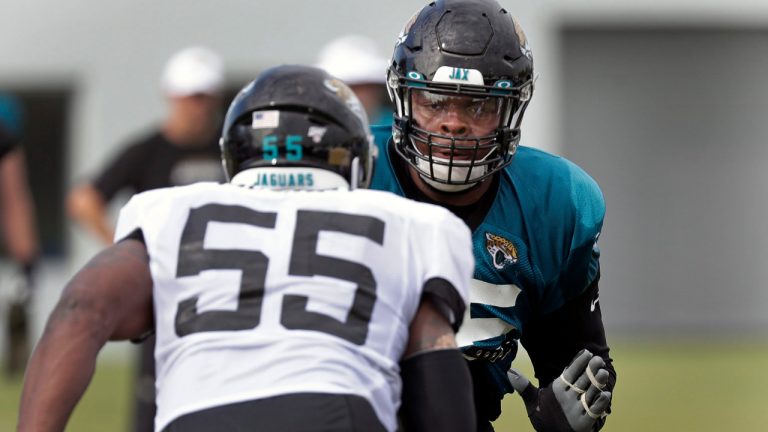 Offensive lineman Jawaan Taylor, right, has signed with Kansas City. (John Raoux/AP) 
