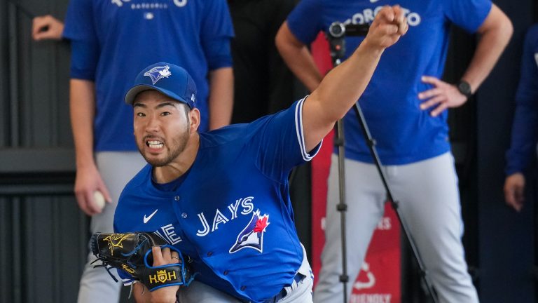 Toronto Blue Jays pitcher Yusei Kikuchi pitches during baseball spring training. (Nathan Denette/CP)