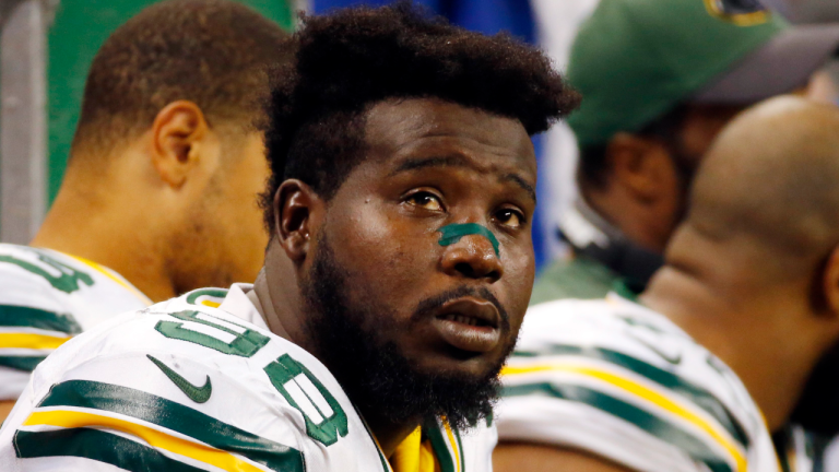 FILE - Green Bay Packers defensive tackle Letroy Guion (98) sits on the bench during the first half of an NFL football game against the Detroit Lions on Dec. 3, 2015, in Detroit. (AP)