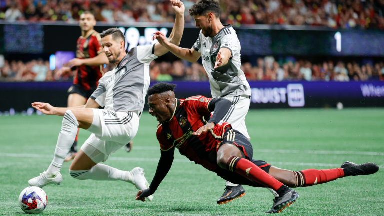 Toronto FC defender Matt Hedges, left, Atlanta United midfielder Derrick Etienne, center, and Toronto FC midfielder Jonathan Osorio, battle for the ball during the second half of an MLS soccer match, Saturday, March 4, 2023, in Atlanta. (AP)