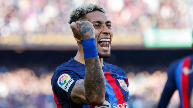 Barcelona's Raphinha celebrates scoring his side's opening goal during Spanish La Liga soccer match between Barcelona and Valencia at the Camp Nou stadium in Barcelona, Spain, Sunday, March 5, 2023. (Joan Monfort/AP) 