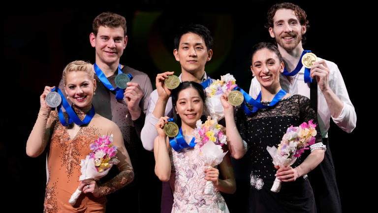 Riku Miura and Ryuichi Kihara of Japan, center, with gold medals, Alexa Knierim and Brandon Frazier of the U.S., left, with silver medals, and Sara Conti and Niccolo Macii of Italy, with bronze medals, pose for a photo during the award ceremony for the pairs' free skating program in the World Figure Skating Championships in Saitama, north of Tokyo, Thursday, March 23, 2023. (AP)