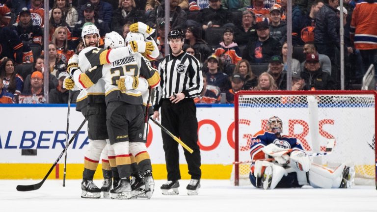 Vegas Golden Knights celebrate the winning goal on Edmonton Oilers goalie Stuart Skinner (74) during overtime NHL action in Edmonton on Saturday March 25, 2023. Jason Franson/THE CANADIAN PRESS