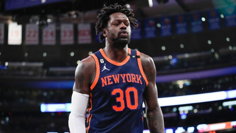 New York Knicks forward Julius Randle grimaces as he leaves the court after being injured in the first half of an NBA basketball game against the Miami Heat, Wednesday, March 29, 2023, at Madison Square Garden in New York. (Mary Altaffer/AP)