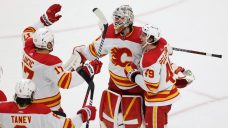 Flames stay in playoff hunt after dramatic review, Markstrom’s heroics