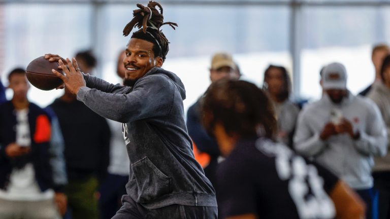 Former NFL and Auburn quarterback, Cam Newton, throws a pass during Auburn Pro Day, Tuesday, March 21, 2023, in Auburn, Ala. (Butch Dill/AP)