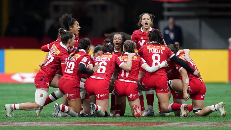 Canada players gather on the field before an HSBC Canada Sevens women's rugby match against Ireland, in Vancouver, B.C., Sunday, March 5, 2023. (Darryl Dyck/CP)