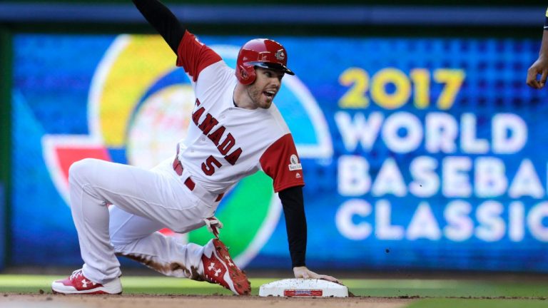 Canada's Freddie Freeman (5) is out stealing second during the first inning in a first-round game against Colombia at the World Baseball Classic, Saturday, March 11, 2017, in Miami. (Lynne Sladky/AP)