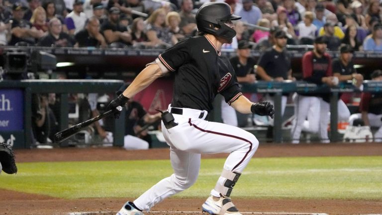 Arizona Diamondbacks' Corbin Carroll hits an RBI single against the Milwaukee Brewers in the first inning during a baseball game, Saturday, Sept. 3, 2022, in Phoenix. (Rick Scuteri/AP)