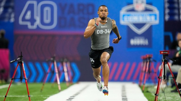 Michigan defensive back DJ Turner II runs the 40-yard dash at the NFL football scouting combine in Indianapolis, Friday, March 3, 2023. (Michael Conroy/AP)