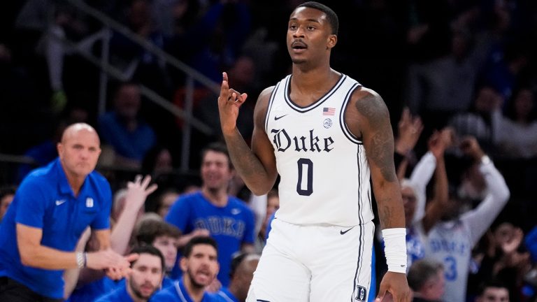 Duke's Dariq Whitehead reacts after scoring three points during the first half of the team's NCAA college basketball game against Iowa in the Jimmy V Classic, Tuesday, Dec. 6, 2022, in New York. (John Minchillo/AP)