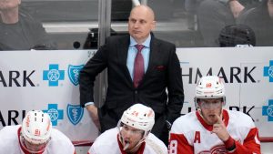 Former Detroit Red Wings coach Derek Lalonde stands behind the bench during the first period of the team's NHL hockey game against the Pittsburgh Penguins in Pittsburgh, Wednesday, Dec. 28, 2022. The Red Wings won 5-4 in overtime. (Gene J. Puskar/AP)