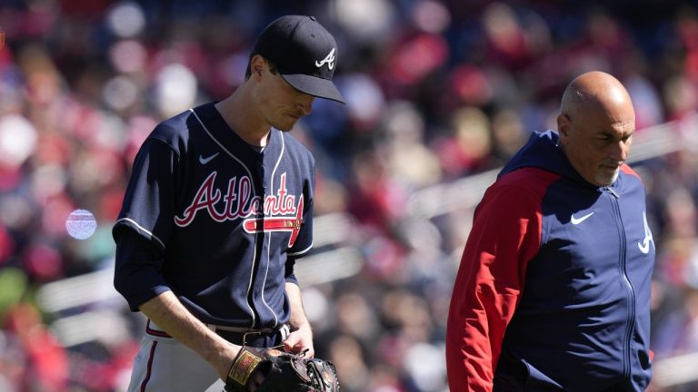 Atlanta Braves starting pitcher Max Fried, left, walks off the field during the fourth inning of an opening day baseball game against the Washington Nationals at Nationals Park, Thursday, March 30, 2023, in Washington. (Alex Brandon/AP)
