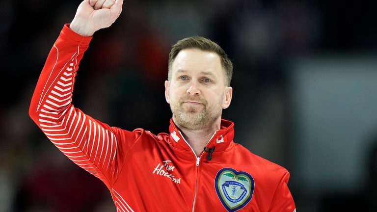Team Canada's Brad Gushue reacts after making a three against Team Manitoba in the eighth end during the finals at the 2023 Tim Hortons Brier in London, Ont., Sunday, March 12, 2023. (Frank Gunn/CP)