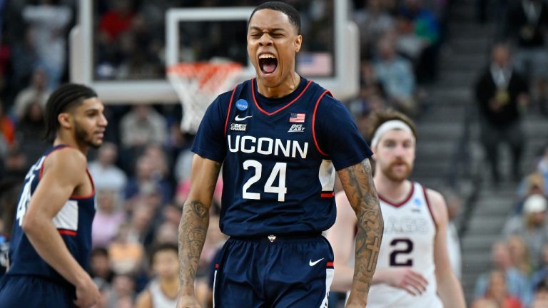 UConn guard Jordan Hawkins (24) celebrates in the second half of an Elite 8 college basketball game against Gonzaga in the West Region final of the NCAA Tournament, Saturday, March 25, 2023, in Las Vegas. (David Becker/AP)