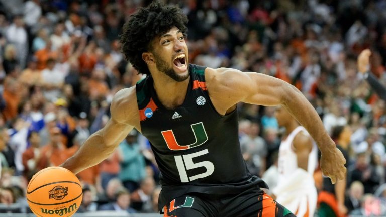 Miami forward Norchad Omier celebrates after their win against Texas in an Elite 8 college basketball game in the Midwest Regional of the NCAA Tournament Sunday, March 26, 2023, in Kansas City, Mo. (Jeff Roberson/AP)