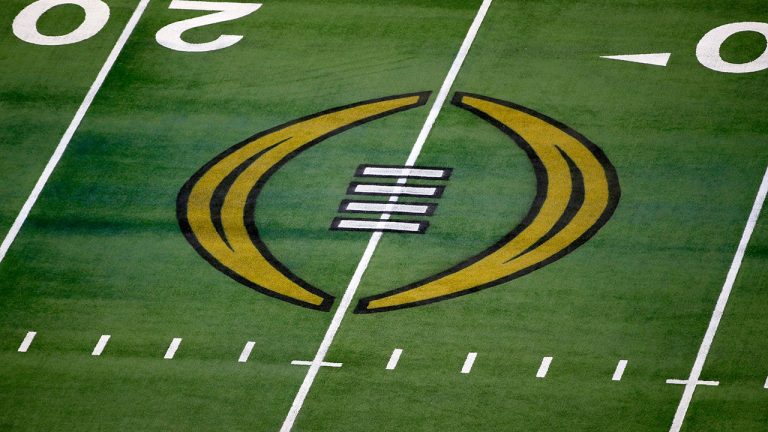 The College Football Playoff logo is shown on the field at AT&T Stadium before the Rose Bowl NCAA college football game between Notre Dame and Alabama in Arlington, Texas, Jan. 1, 2021. (Roger Steinman/AP)