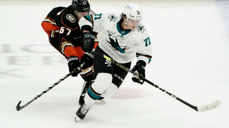 San Jose Sharks defenceman Nikolai Knyzhov, right, has signed a new two-year extension. (Jae C. Hong/AP)