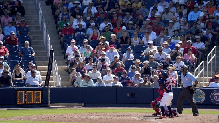 Houston Astros' Jose Altuve (27) bats as the pitch clock ticks down during the fifth inning of a spring training baseball game against the Boston Red Sox Wednesday, March 1, 2023, in West Palm Beach, Fla. (Jeff Roberson/AP)