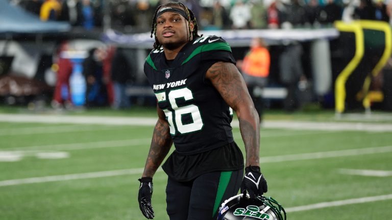 New York Jets linebacker Quincy Williams (56) walks off the field after an NFL football game against the Jacksonville Jaguars on Thursday, Dec. 22, 2022, in East Rutherford, N.J. Williams agreed Sunday, March 12, 2023, on a three-year deal, according to a person with knowledge of the contract. The deal is for $18 million and includes $9 million in guarantees, according to the person who spoke to The Associated Press on condition of anonymity because the team didn’t announce the agreement. (Adam Hunger/AP)