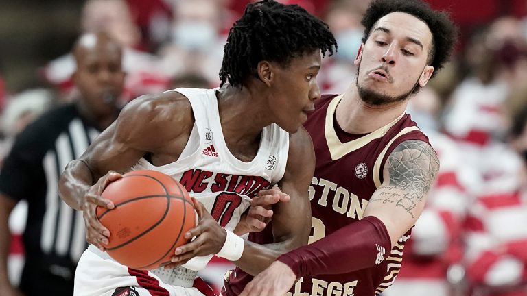 Boston College guard Jaeden Zackery defends against North Carolina State guard Terquavion Smith during the first half of an NCAA college basketball game in Raleigh, N.C., Wednesday, Feb. 23, 2022. (Gerry Broome/AP)