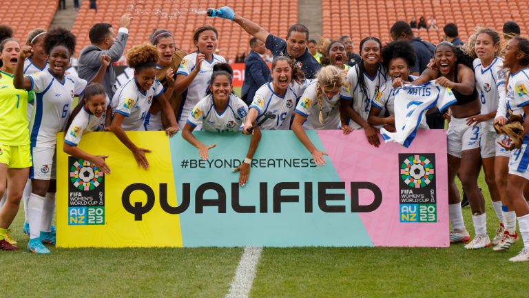 Panama players celebrate after defeating Paraguay in their FIFA women's World Cup qualifier in Hamilton, New Zealand, Thursday, Feb. 23, 2023. (Martin Hunter/Photosport via AP)