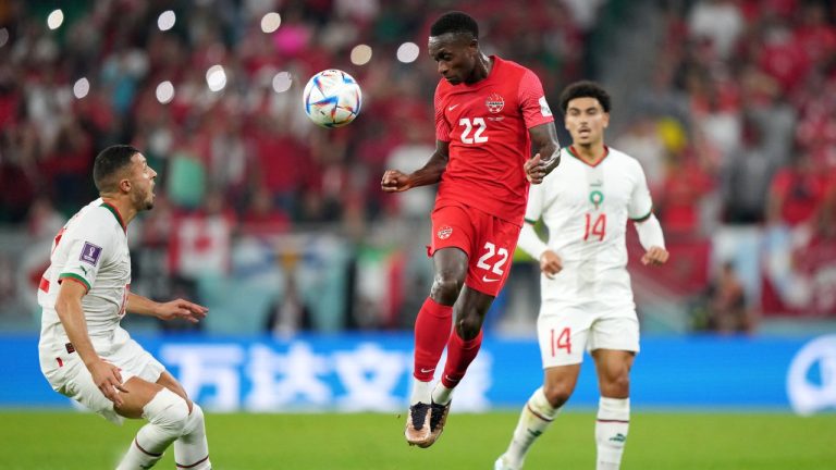 Canada midfielder Richie Laryea (22) plays the ball in front of Morocco midfielder Selim Amallah (15) as forward Zakaria Aboukhlal (14) looks on during second half group F World Cup soccer action at the Al Thumama Stadium in Doha, Qatar on Thursday, December 1, 2022. The CONCACAF Nations League finals will be held at Las Vegas' Allegiant Stadium, CONCACAF announced Monday. (Nathan Denette/CP)