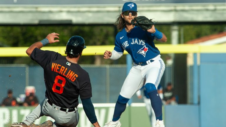 Toronto Blue Jays’ Bo Bichette forces out the Detroit Tigers’ Matt Vierling during a spring training game at TD Ballpark in Dunedin, Fla., Saturday, March 25, 2023. (Mark Taylor/CP)