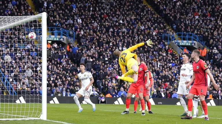 Leeds United's Jack Harrison scores his side's second goal of the game, during the English Premier League soccer match between Leeds United and Brighton and Hove, at Elland Road, in Leeds, England, Saturday March 11, 2023. (AP)