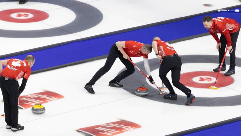 Team Canada makes a shot against Team Ontario during the Tim Hortons Brier at Budweiser Gardens in London, Ont. on Saturday, March 4, 2023. (Nicole Osborne/CP)