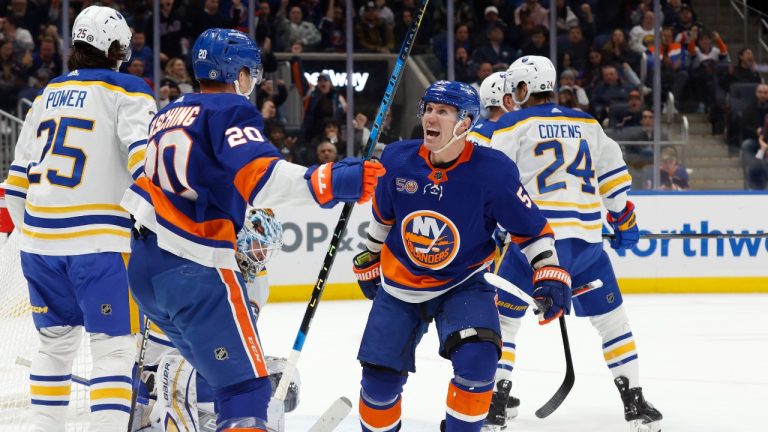 New York Islanders' Casey Cizikas (53) celebrates with teammate Hudson Fasching (20) after scoring a goal against the Buffalo Sabres during the second period of an NHL hockey game Tuesday, March 7, 2023, in Elmont, N.Y. (Jason DeCrow/AP Photo)
