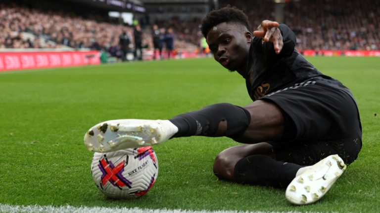 Arsenal's Bukayo Saka kicks the ball during the English Premier League soccer match between Fulham and Arsenal at Craven Cottage stadium in London, Sunday, March 12, 2023. (Ian Walton/AP)
