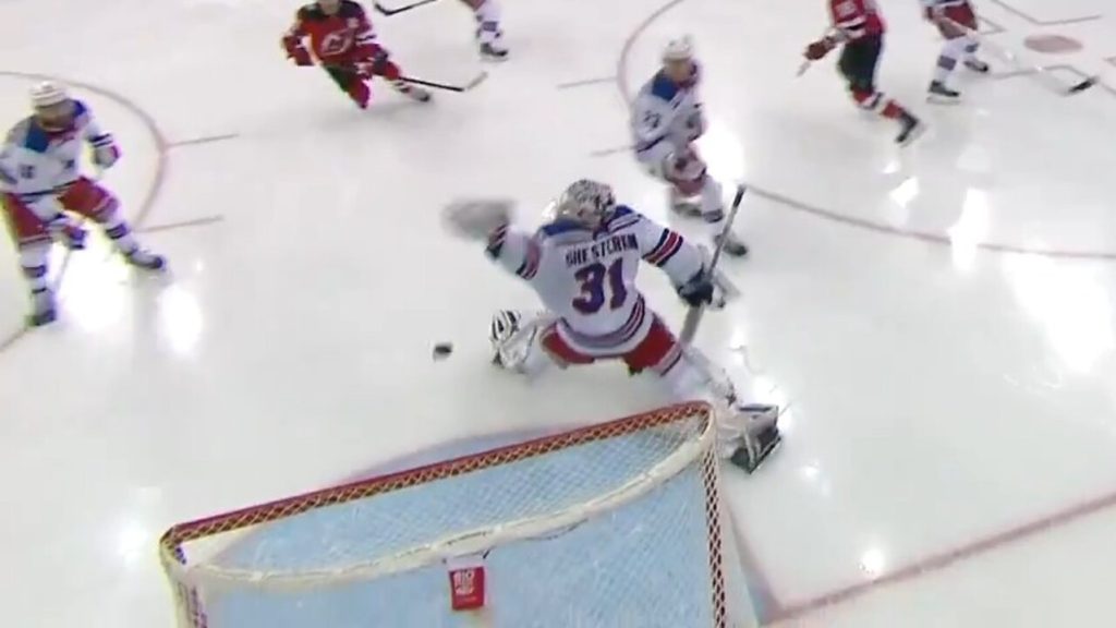 Rangers’ Fox deflects puck over Shesterkin as Devils score in opening