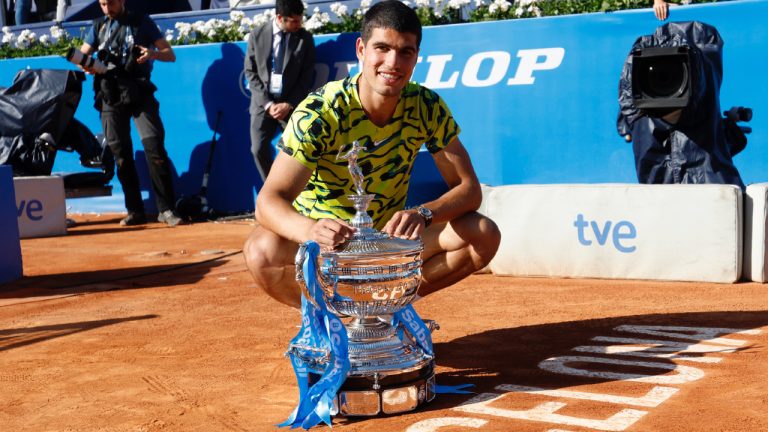 Carlos Alcaraz, of Spain, poses with the trophy after winning the final Godo tennis tournament against Stefanos Tsitsipas, of Greece, in Barcelona, Spain, Sunday, April 23, 2023. (Joan Monfort/AP)