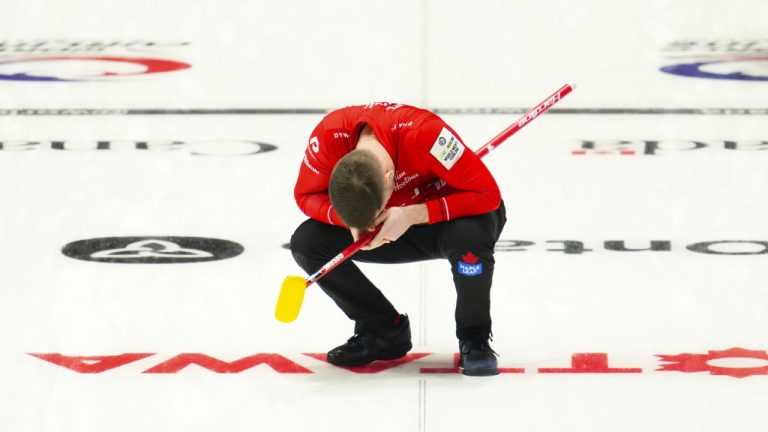Canadian skip Brad Gushue reacts after delivering a stone while taking on Switzerland at the Men's World Curling Championship in Ottawa on Saturday, April 1, 2023. (Sean Kilpatrick/CP)