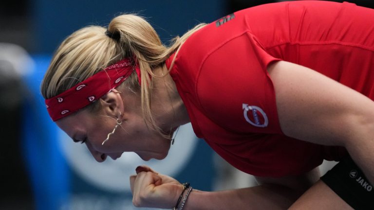 Belgium's Ysaline Bonaventure celebrates after defeating Canada's Rebecca Marino during a Billie Jean King Cup qualifiers singles match, in Vancouver, on Friday, April 14, 2023. (Darryl Dyck/CP)