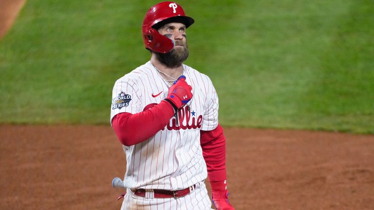 Philadelphia Phillies' Bryce Harper walks to the dugout after striking out during the fourth inning in Game 4 of baseball's World Series between the Houston Astros and the Philadelphia Phillies on Wednesday, Nov. 2, 2022, in Philadelphia. (Chris Szagola/AP)