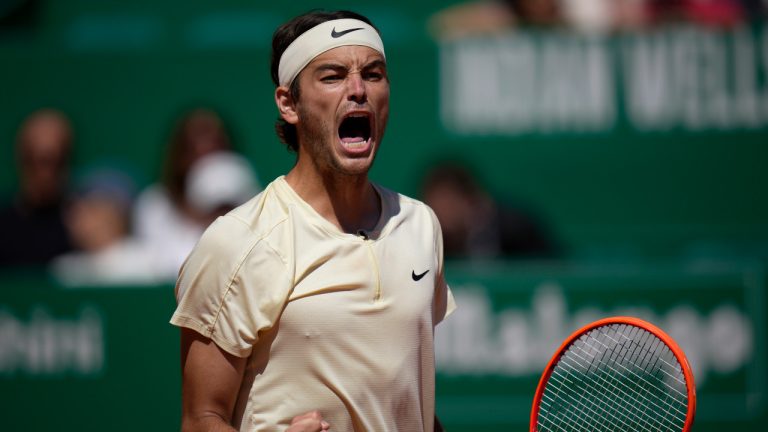 Taylor Fritz, of the United States, celebrates after defeating Stefanos Tsitsipas, of Greece, 6/2, 6/4, in their Monte Carlo Tennis Masters quarterfinals match in Monaco, Friday, April 14, 2023. (Daniel Cole/AP) 