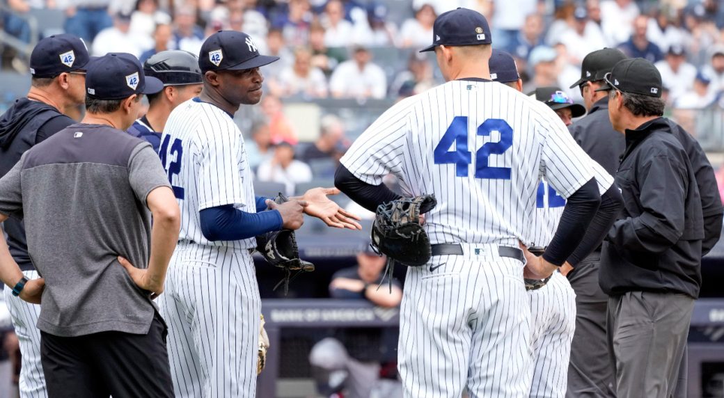 Twins’ Baldelli ejected, after Yankees’ German stays in game after ump check