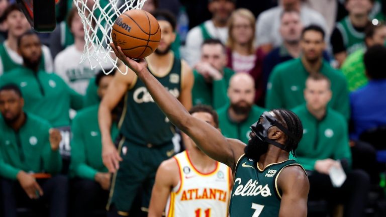 Boston Celtics' Jaylen Brown (7) shoots in front of Atlanta Hawks' Trae Young (11) in the first half during Game 1 in the first round of the NBA basketball playoffs, Saturday, April 15, 2023, in Boston. (Michael Dwyer/AP)