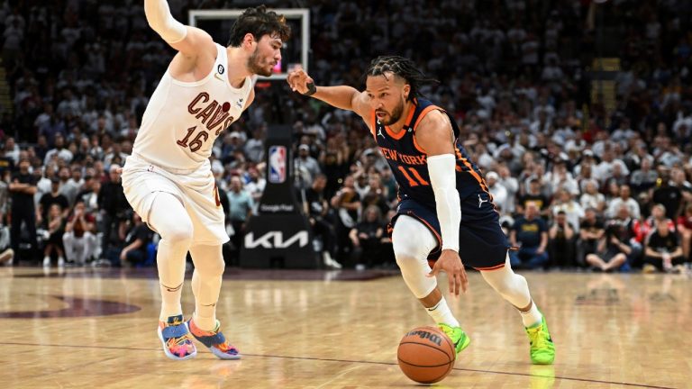New York Knicks' Jalen Brunson (11) drives against Cleveland Cavaliers' Cedi Osman (16) during the second half of Game 1 in a first-round NBA basketball playoffs series Saturday, April 15, 2023, in Cleveland. (Nick Cammett/AP)