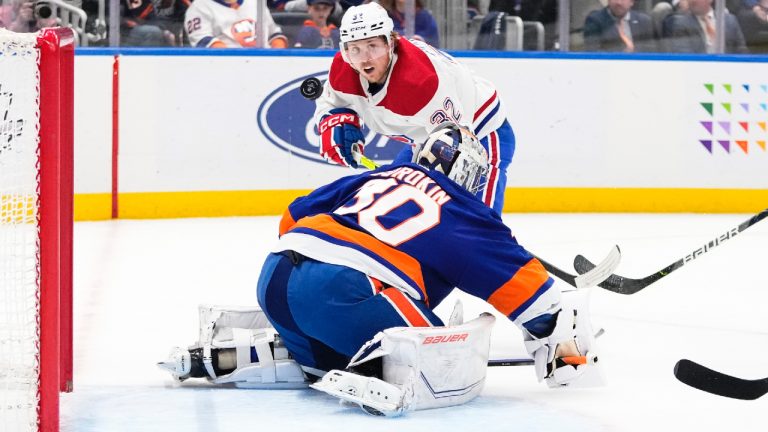 Montreal Canadiens' Rem Pitlick (32) shoots on New York Islanders goaltender Ilya Sorokin (30) during the first period of an NHL hockey game Wednesday, April 12, 2023, in Elmont, N.Y. (Frank Franklin II/AP)