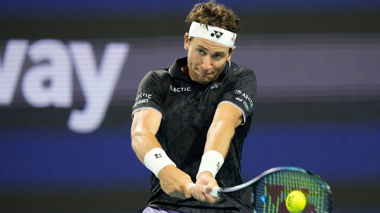 Casper Ruud, of Norway, returns a shot from Botic van de Zandschulp, of the Netherlands, during the Miami Open tennis tournament, Sunday, March 26, 2023, in Miami Gardens, Fla. (Wilfredo Lee/AP)